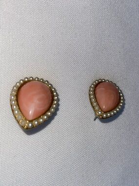 Vintage style stud earrings featuring teardrop shaped faux pink stone earrings